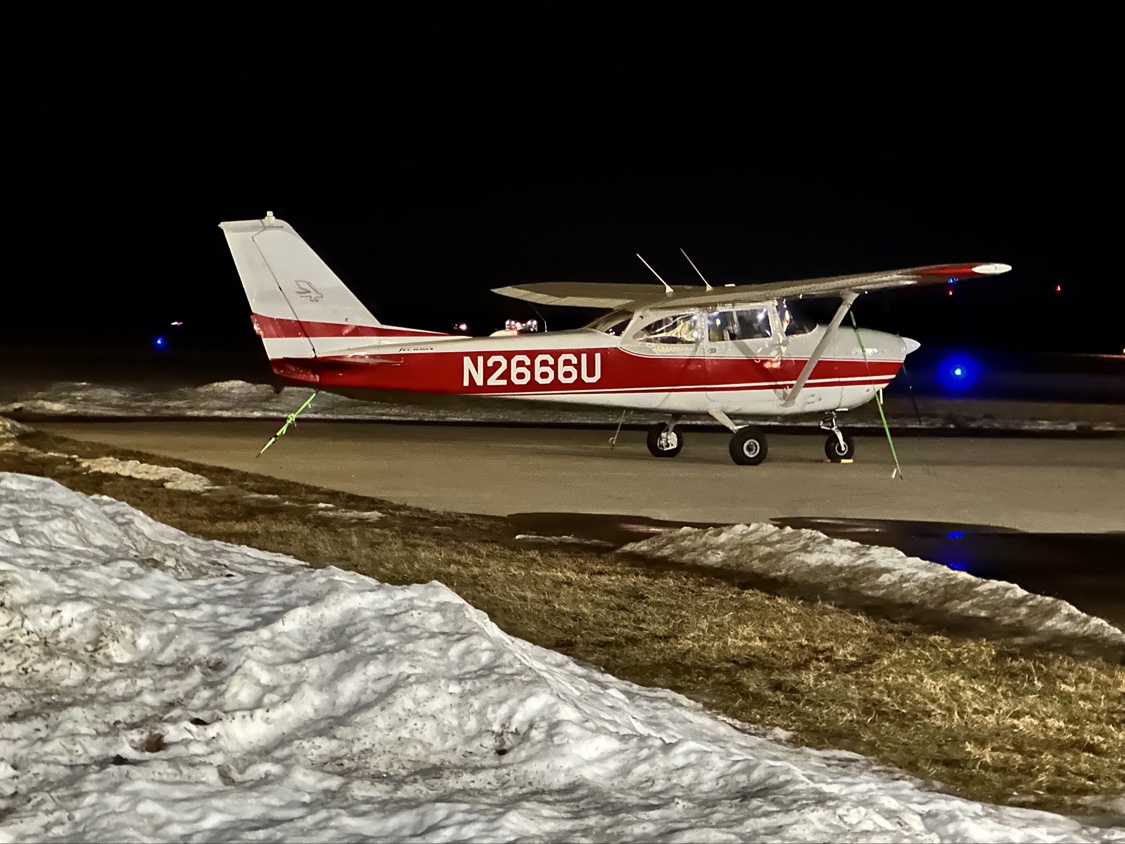 N2666U Cessna 172 tied down at night